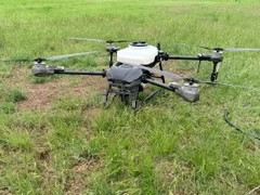 Centex Agri-Drone's Revolution I-19 sitting in a green pasture